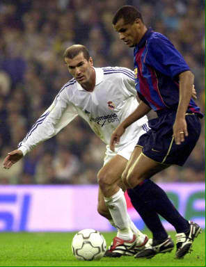 Trying to get the ball from Rivaldo